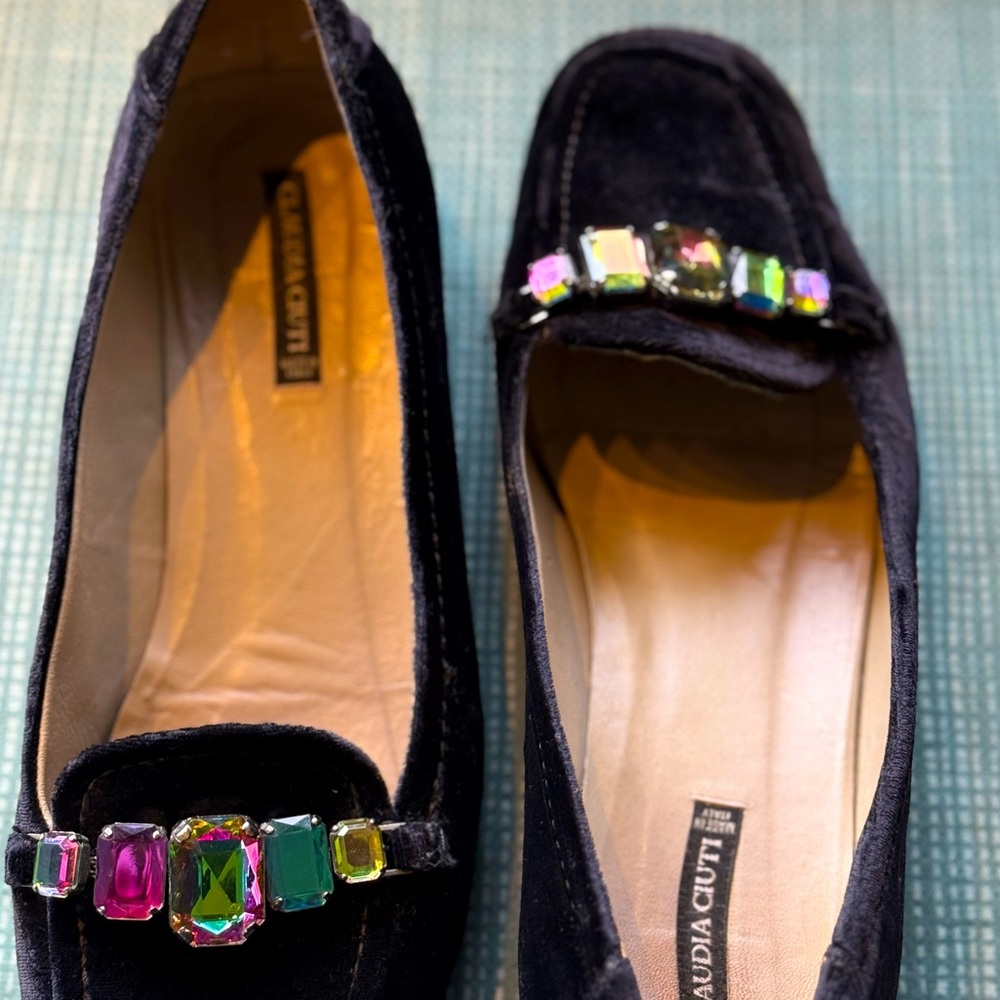 Worn Elegant Black Flats with Jewel Embellishments